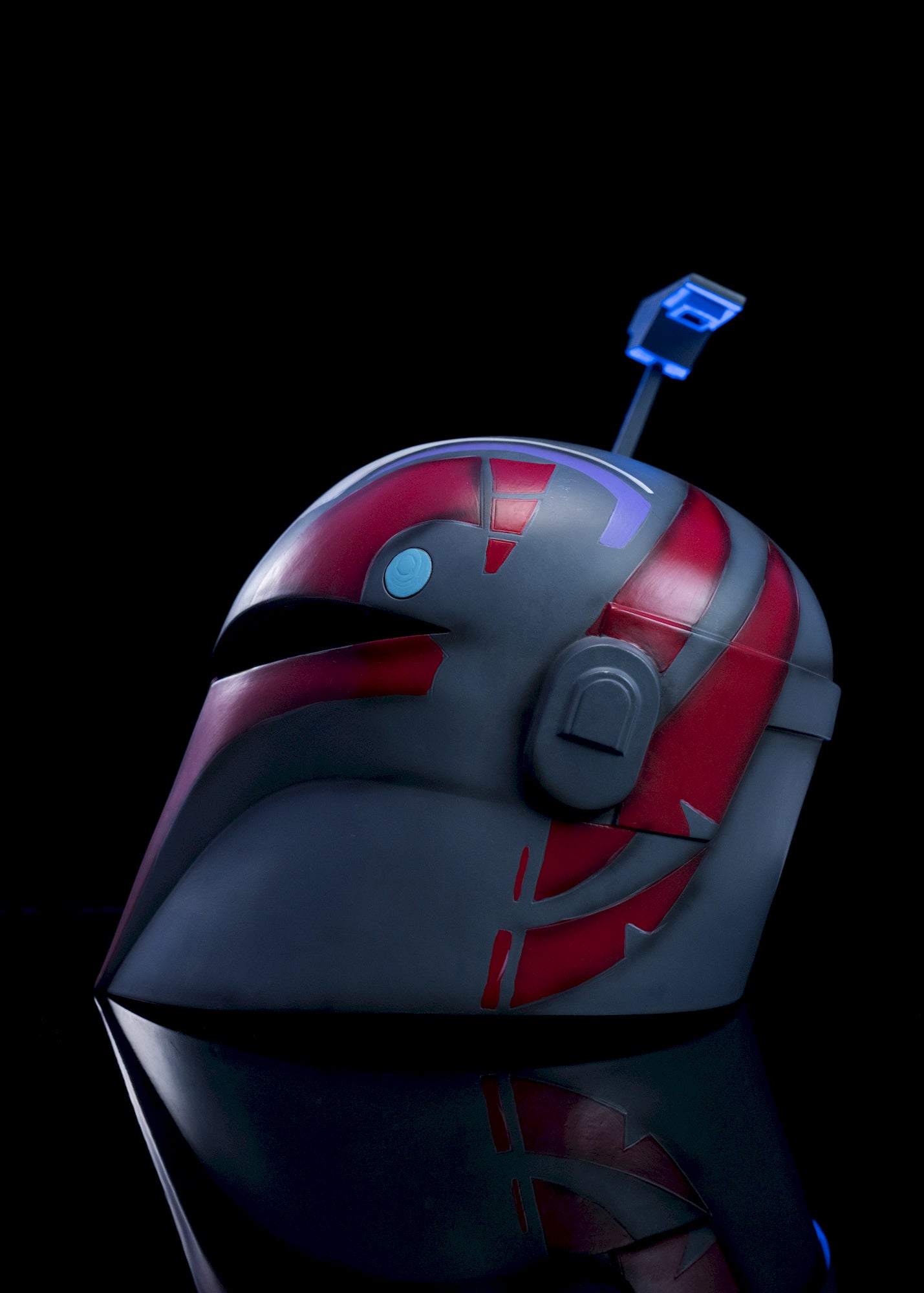 Sabine Wren Helmet left side view red, black, and gray Mandalorian helmet showing unique painted design and weathered detailing